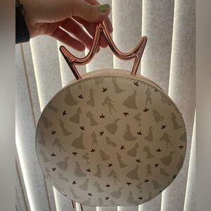Loungefly bag with handle and strap. Disney princess theme & rose gold details.